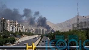 Israel strikes state-run Iranian TV after Iranian missiles kill eight