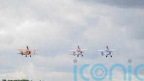 Three granddaughters complete ‘world first’ by flying in formation on three aeroplanes in ‘powerful’ triple wing-walk