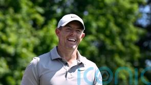 Rory McIlroy trails by two as Scottie Scheffler holds share of lead