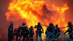 More than 100 firefighters battle large wildfire on Greek island
