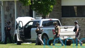 Man’s mother is member of Michigan church where he opened fire before being shot