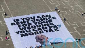 Bezos arrives in Venice as protesters say wedding highlights growing inequality