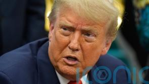 Trump says he is terminating trade talks with Canada over tax on tech firms