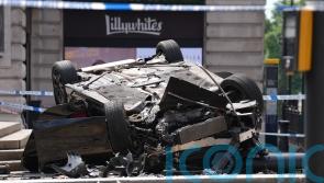 Young man fighting for life after BMW overturns in Piccadilly Circus
