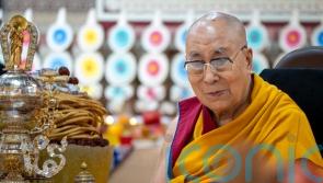Dalai Lama says he plans to reincarnate after his death