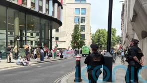 Protesters turn out as woman appears in court over alleged support for Hamas