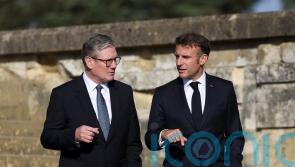 Macron to arrive in UK with Starmer set to press for help on small boats