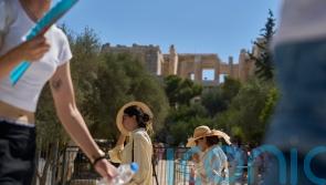 Greece shuts the Acropolis as work restrictions remain amid heatwave