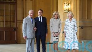 Charles bids farewell to President Macron during touching goodbye