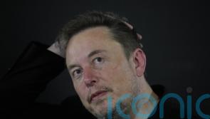 Elon Musk says his new AI model ‘better than PhD level in everything’