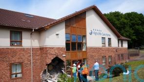 Two arrested after care home crash leaves eight in hospital