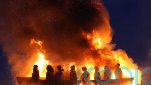 ‘Hate incident’ Co Tyrone bonfire topped with migrant effigy lit