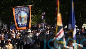 Tens of thousands take part in Twelfth celebrations in scorching temperatures