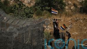 Clashes rage in Syrian city as Israel launches strike on Damascus