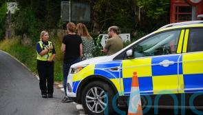 Child dies after school coach carrying more than 60 people crashes on day trip
