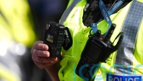 Man arrested after ‘displaying terror group poster in his window’