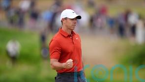 Rory McIlroy makes strong start on day three to climb The Open leaderboard