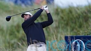 Scottie Scheffler takes grip of Open as Rory McIlroy charges up leaderboard