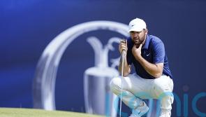 Open leader Scottie Scheffler starts with birdie to dampen hopes of chasing pack