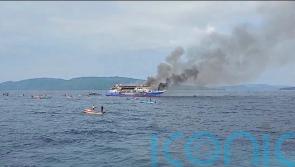 At least five dead after Indonesian passenger ferry catches fire at sea