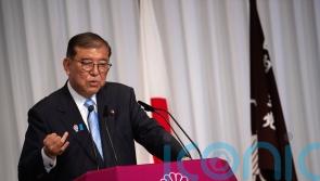 Japan’s PM Ishiba says he will stay in office despite election loss