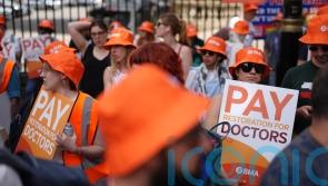 Row over NHS doctor strike deepens as poll suggests public support is waning