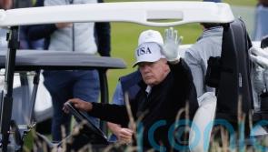 Donald Trump goes golfing as protesters speak out against his visit to Scotland