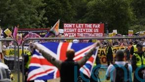 Protesters stage demo outside hotel used to house migrants