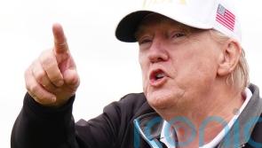 Trump opens his new Scottish golf course before return to US to ‘put out fires’