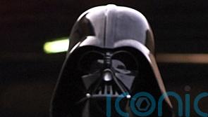 Darth Vader&rsquo;s Star Wars lightsabre and Michael Keaton Batman suit go to auction