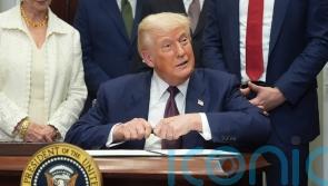 Trump signs order imposing new tariffs on a number of trading partners