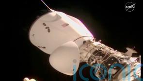 SpaceX delivers new crew to orbiting station in just 15 hours