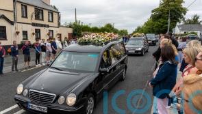 Murdered mother and children ‘together and finally safe’ – funeral hears