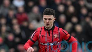 Connor Barrett scores stoppage-time winner as 10-man Walsall stun Swindon