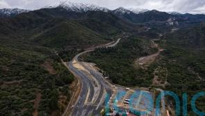 Rescue workers find body amid race to save people trapped in Chile copper mine