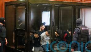 Trial begins for suspects in Moscow concert hall attack that killed 149 people