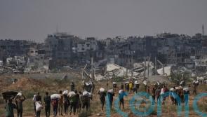 Dozens killed as Palestinians in Gaza scramble for aid from air and land