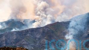 Crews struggle to contain massive California wildfire