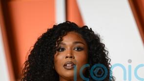 Pop star Lizzo talks about her weight loss and says she likes how she looks now