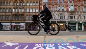Purple pavement markings part of Mind the Grab campaign to tackle phone theft
