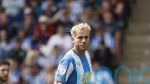 Jack Whatmough and Cameron Ashia continue Huddersfield’s winning start