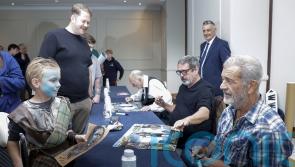 Mel Gibson poses for selfies with fans to mark 30 years of Braveheart film