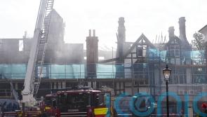 Two girls arrested after historic hotel destroyed in suspected arson attack