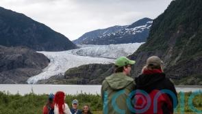 Homeowners warned of flood risk as lake starts to break through ice dam