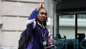 Djed Spence signs new contract at Tottenham