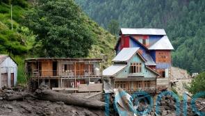 Flash floods triggered by torrential rains kill 280 in India and Pakistan