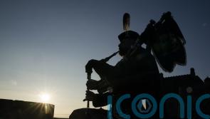 Lone piper plays at Edinburgh Castle to mark 80th anniversary of VJ Day