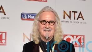 Sir Billy Connolly warns fans of scammers impersonating him online