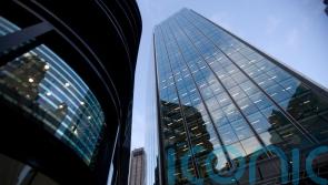 FTSE posts new closing high as falls in defence stocks are offset by retail gains