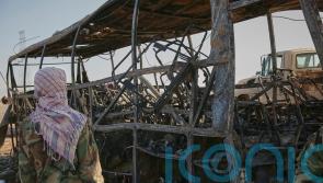 Bus crash in Afghanistan kills more than 70 people returning from Iran